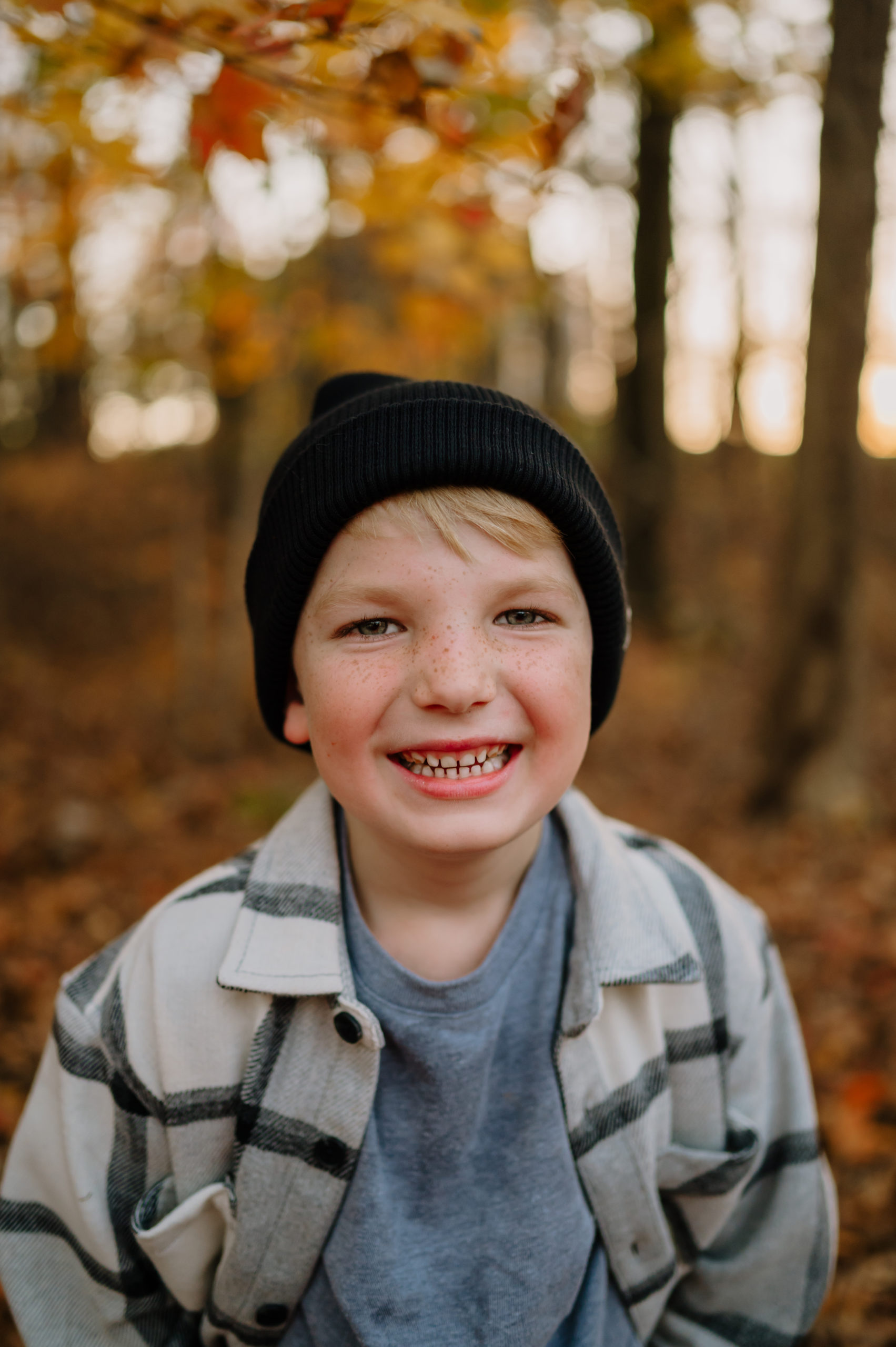 Boy with a hat on smiling