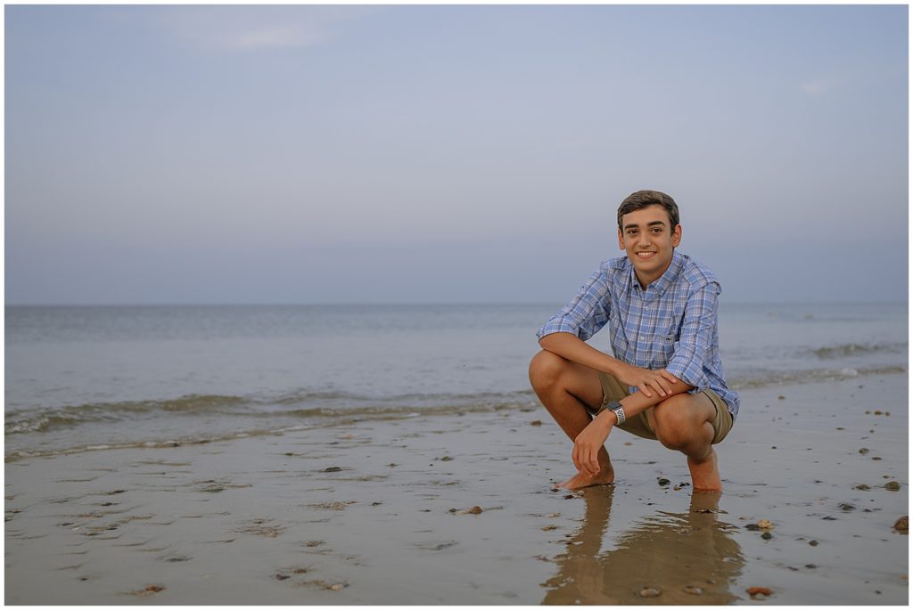 Boy on a Cape Cod Beach posing for his Cape Cod Senior Picture. 