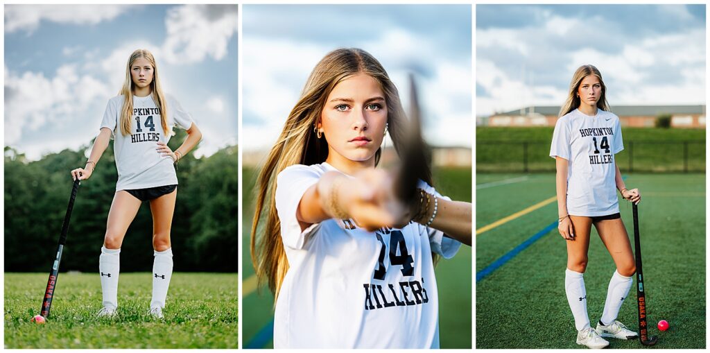 Boston Sports Photography image of a girl wearing a field hockey jersey and pointing her field hockey stick towards the camera. 