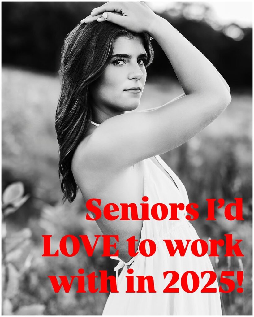 Black and white image of a senior with her hands over her head