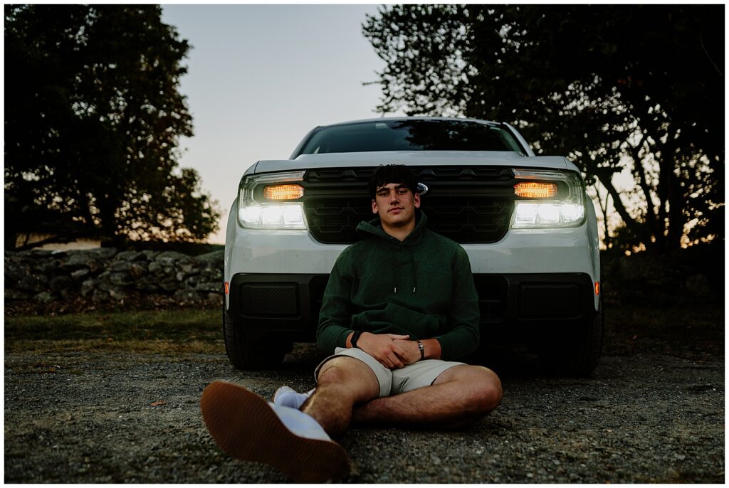 Boston Senior session with senior boy sitting in front of his truck