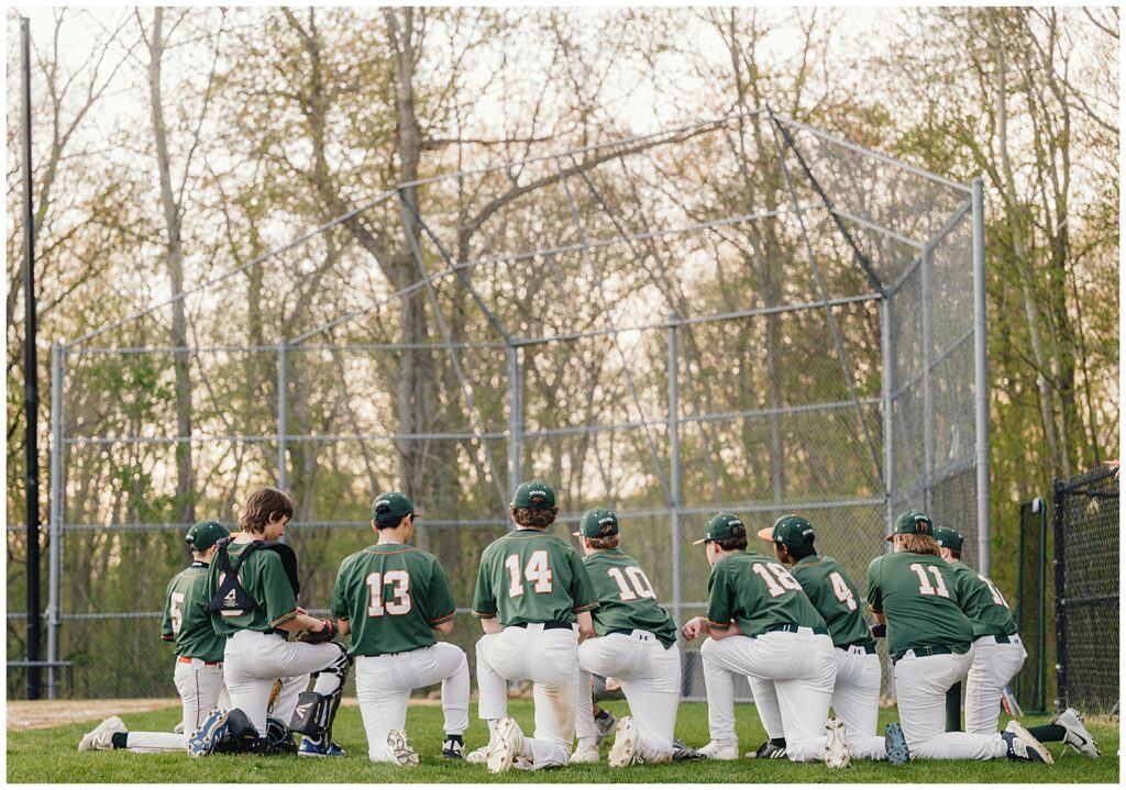 Professional sports photographer in Boston photographing athletes during baseball game