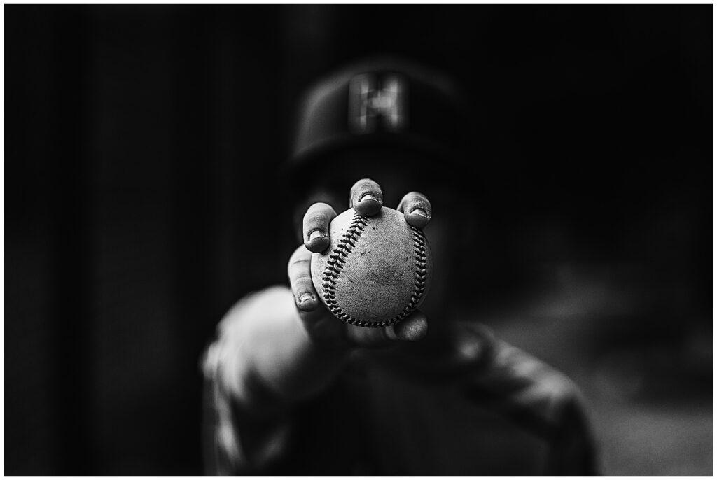 Baseball being held by athlete during dynamic sports session Hopkinton 