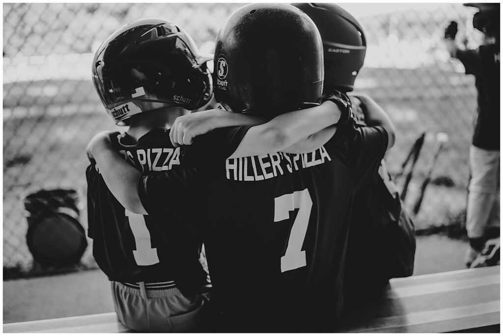 Boys hugging for Massachusetts sports tips 