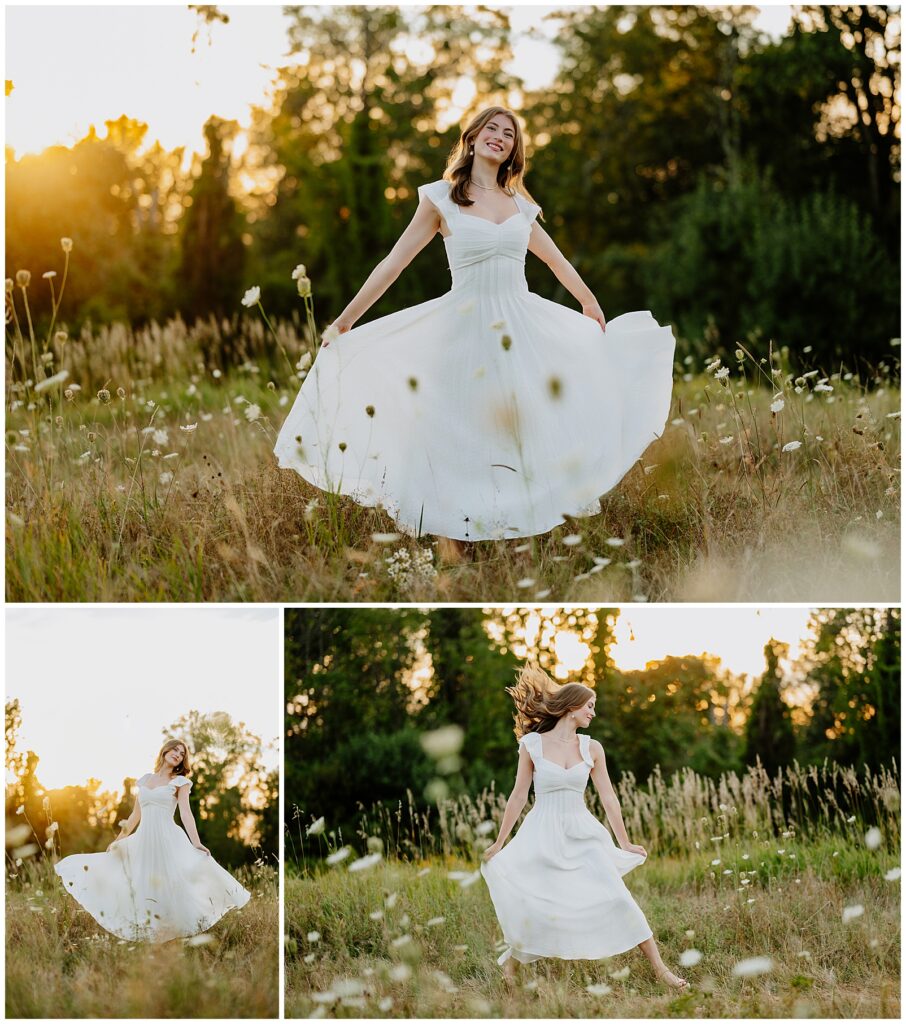 High school senior in a white dress twirling in a grassy field at golden hour, smiling and posing during her senior photo session.