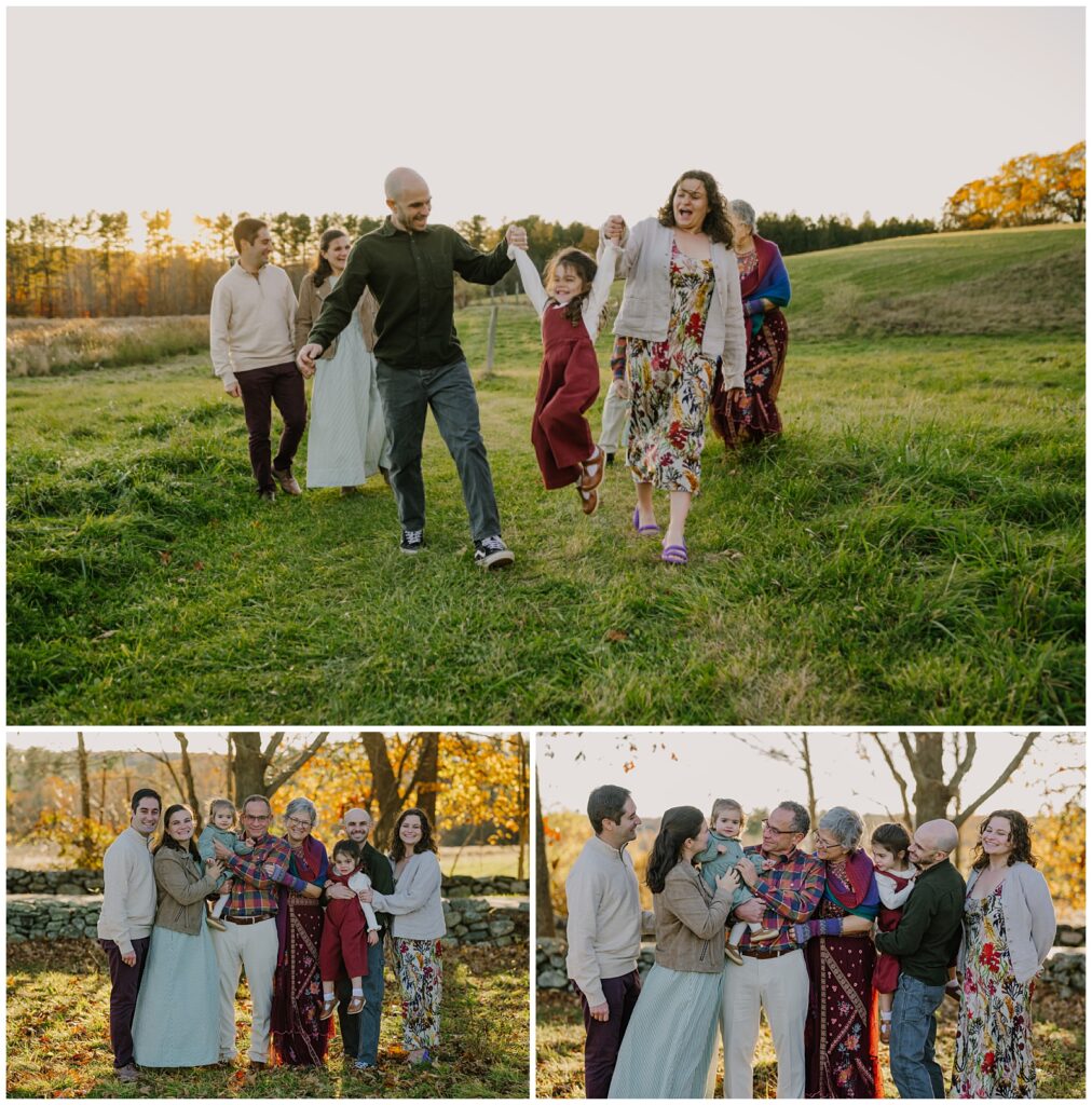 Multi-generational family session at a New England farm in autumn, parents swinging a child between them while extended family walks through golden light, MetroWest Massachusetts family photographer
