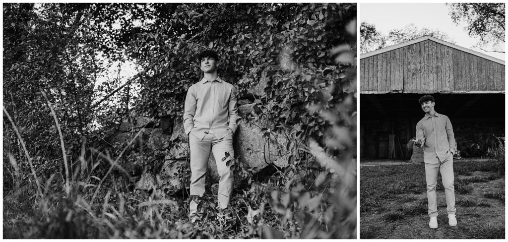 Black and white senior portraits of a boy leaning against an ivy covered stone wall and barn in Southborough, MA.