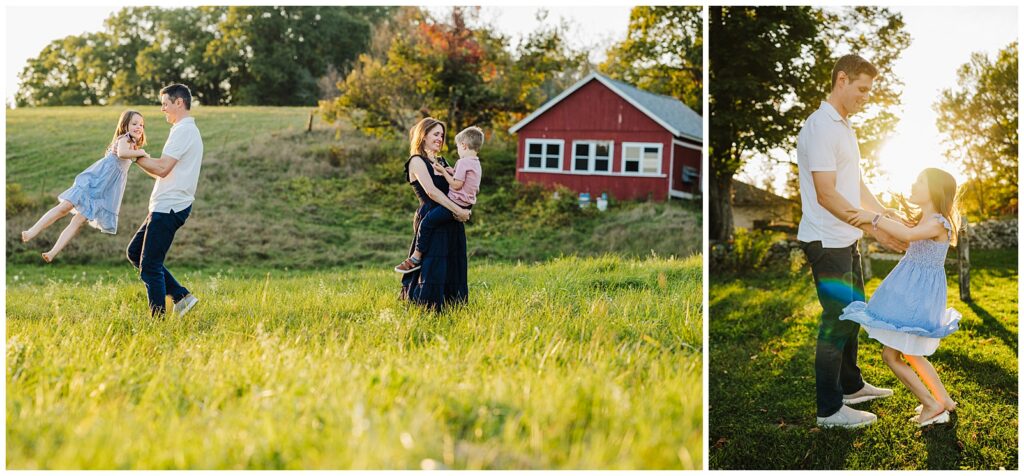 Parents playing with their kids in a meadow near the red barn at Chestnut Hill Farm in Southborough Massachusetts